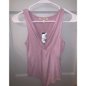 Lilac colored knotted front body suit